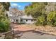 Single-story house with brick driveway and lush landscaping at 2072 Jessup Rd, Oviedo, FL 32765