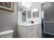 Small bathroom with toilet and vanity with a sink at 219 Plumoso Loop, Davenport, FL 33897