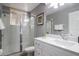 Bathroom with shower, toilet and vanity with a sink at 219 Plumoso Loop, Davenport, FL 33897