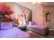 Light and bright bedroom with two twin beds and a castle mural at 219 Plumoso Loop, Davenport, FL 33897