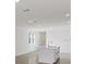 Open concept kitchen with island and stainless steel appliances at 248 Links Terrace Blvd, Daytona Beach, FL 32124