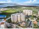 Aerial view of condo building near the beach, showcasing its location and amenities at 263 Minorca Beach Way # 301, New Smyrna Beach, FL 32169