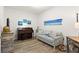 Common area with piano, sofa, and nautical decor at 263 Minorca Beach Way # 301, New Smyrna Beach, FL 32169