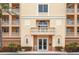 Building exterior featuring Spanish-style architecture at 263 Minorca Beach Way # 301, New Smyrna Beach, FL 32169