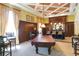 Community game room with pool table and wet bar at 263 Minorca Beach Way # 301, New Smyrna Beach, FL 32169