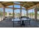 Indoor community room with ping pong table at 263 Minorca Beach Way # 301, New Smyrna Beach, FL 32169