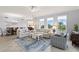 Spacious living room with ample natural light and comfortable seating at 263 Minorca Beach Way # 301, New Smyrna Beach, FL 32169