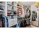 Large walk-in closet with ample shelving and hanging space at 263 Minorca Beach Way # 301, New Smyrna Beach, FL 32169