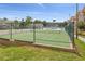 Community tennis court with chain link fence at 3149 Britannia Blvd # B, Kissimmee, FL 34747