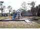 playground with a slide and playset at 3700 Idlebrook Cir # 208, Casselberry, FL 32707