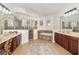 Luxurious Primary bathroom with double vanities, a soaking tub, and a shower at 5210 Sailwind Cir, Orlando, FL 32810