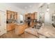 Large kitchen with an island, ample cabinetry, and granite countertops at 5210 Sailwind Cir, Orlando, FL 32810