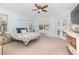 Main bedroom with a king-size bed, ample natural light and access to the backyard at 5210 Sailwind Cir, Orlando, FL 32810