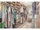 Large walk-in closet with ample shelving and hanging space at 5210 Sailwind Cir, Orlando, FL 32810