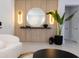 Modern entryway with a large mirror and stylish decor at 526 First Cape Coral Dr, Winter Garden, FL 34787