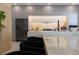 Modern kitchen with marble island and stainless steel appliances at 526 First Cape Coral Dr, Winter Garden, FL 34787