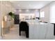 Modern kitchen with wood cabinets and marble island at 526 First Cape Coral Dr, Winter Garden, FL 34787