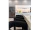 Modern kitchen with sleek gray cabinets and a large island at 526 First Cape Coral Dr, Winter Garden, FL 34787