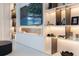 Modern media wall with integrated lighting and shelving at 526 First Cape Coral Dr, Winter Garden, FL 34787