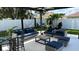 Relaxing patio area with comfortable seating and hammocks at 526 First Cape Coral Dr, Winter Garden, FL 34787