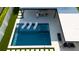 Modern, expansive pool with spa, and a covered patio area at 526 First Cape Coral Dr, Winter Garden, FL 34787