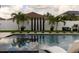 Relaxing pool area with a water feature and lounge chairs at 526 First Cape Coral Dr, Winter Garden, FL 34787