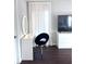 Modern vanity with a lit mirror and comfortable chair at 526 First Cape Coral Dr, Winter Garden, FL 34787