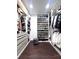Large walk-in closet with ample shelving and hanging space at 526 First Cape Coral Dr, Winter Garden, FL 34787