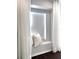 Cozy window seat with comfortable pillows at 526 First Cape Coral Dr, Winter Garden, FL 34787