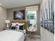 Cozy bedroom with wicker headboard and window seat at 5278 Bowspirit Way, St Cloud, FL 34769