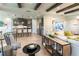 Open living room with exposed beams and kitchen views at 5278 Bowspirit Way, St Cloud, FL 34769