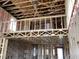 Interior framing of a two-story home under construction at 5748 Haystack Dr, St Cloud, FL 34771