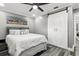 Comfortable bedroom with barn door closet, offering modern charm and functionality at 6121 Bass Hwy, St Cloud, FL 34771