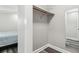 Empty closet with a rod and shelf, ready to be organized in a well-lit space at 6121 Bass Hwy, St Cloud, FL 34771