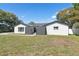 Charming single-story home with freshly painted exterior and metal roof at 6121 Bass Hwy, St Cloud, FL 34771