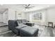 Inviting living room with a comfortable gray sectional, natural light, and modern decor at 6121 Bass Hwy, St Cloud, FL 34771