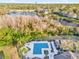 Community pool and spa with lake view in the background at 629 Dory Ln # 108, Altamonte Springs, FL 32714