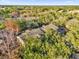 Community overview showcasing lush landscaping and lake at 629 Dory Ln # 108, Altamonte Springs, FL 32714
