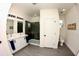 Modern bathroom with double vanity, frameless shower, and grey tile at 741 Rioja Dr, Minneola, FL 34715