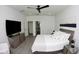 Bedroom with a king-size bed and en-suite bathroom access at 741 Rioja Dr, Minneola, FL 34715