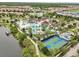 Aerial view showcasing the community's resort-style pool, lazy river, and recreational facilities at 8833 Corcovado Dr, Kissimmee, FL 34747