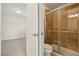 Bathroom with shower and toilet, updated tile at 8833 Corcovado Dr, Kissimmee, FL 34747