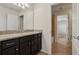 Bathroom features dark wood vanity and granite top at 8833 Corcovado Dr, Kissimmee, FL 34747