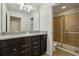 Double vanity bathroom with granite countertops at 8833 Corcovado Dr, Kissimmee, FL 34747