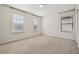 Simple bedroom with neutral walls, carpet, and window coverings at 8833 Corcovado Dr, Kissimmee, FL 34747