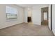 Bedroom with ensuite bathroom and large window at 8833 Corcovado Dr, Kissimmee, FL 34747