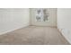 Bright bedroom with neutral-colored walls and carpeted floors at 8833 Corcovado Dr, Kissimmee, FL 34747