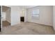 Carpeted bedroom with ensuite bathroom access at 8833 Corcovado Dr, Kissimmee, FL 34747