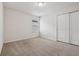 Bright bedroom featuring carpeted floor and window at 8833 Corcovado Dr, Kissimmee, FL 34747
