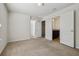 Well-lit bedroom with access to a full bathroom at 8833 Corcovado Dr, Kissimmee, FL 34747